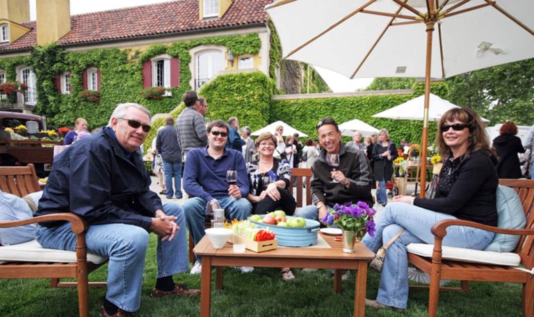 Guests enjoy the outdoors while sipping on Cabernet Sauvignon