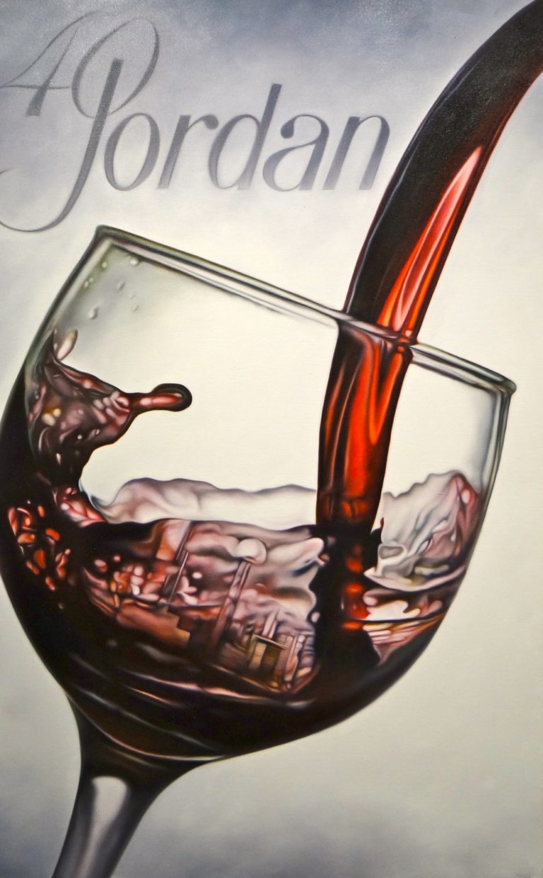 A piece of art from the 4 on 4 Jordan Winery art competition. Soft smoke backlighting red wine as it's poured into a glass. "40" and "Jordan" are written in the top left. In the ripples of wine there is a cityscape.