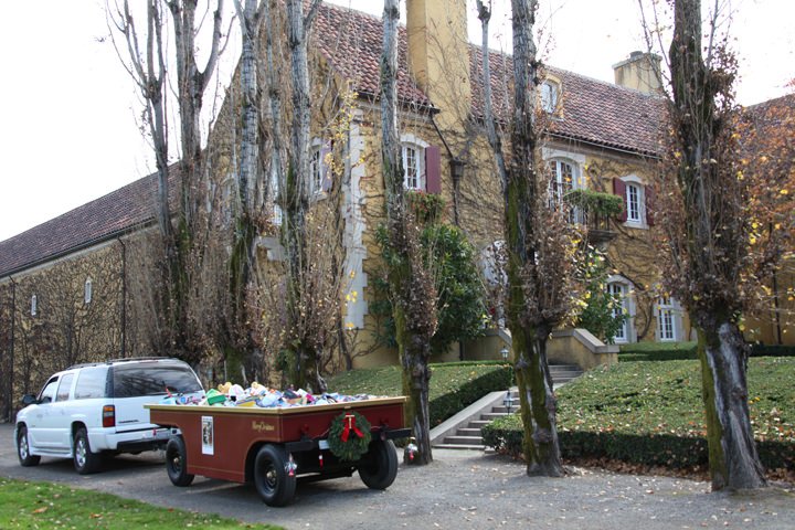 an SUV towing the Jordan Winery grape gondola full of toys at Jordan Winery