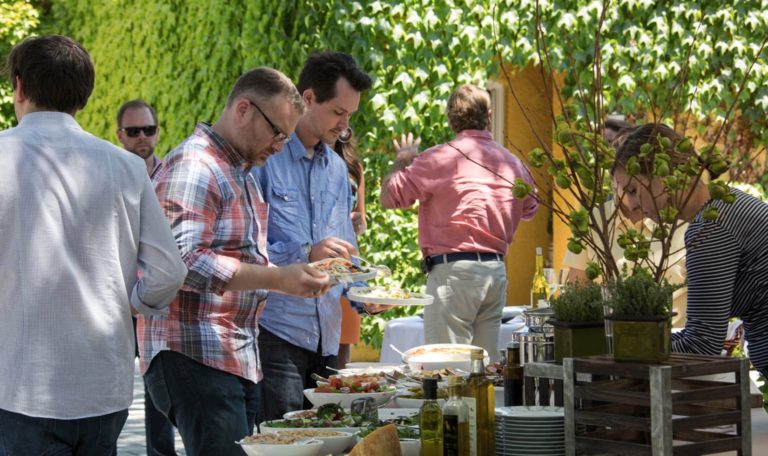 guests serving themselves at a buffet table set up for a Sommelier lunch event at Jordan Winery