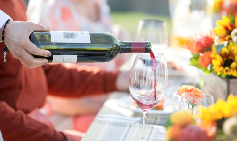 Jordan Winery Cabernet being poured into a glass at a Sunset Supper at Vista Point