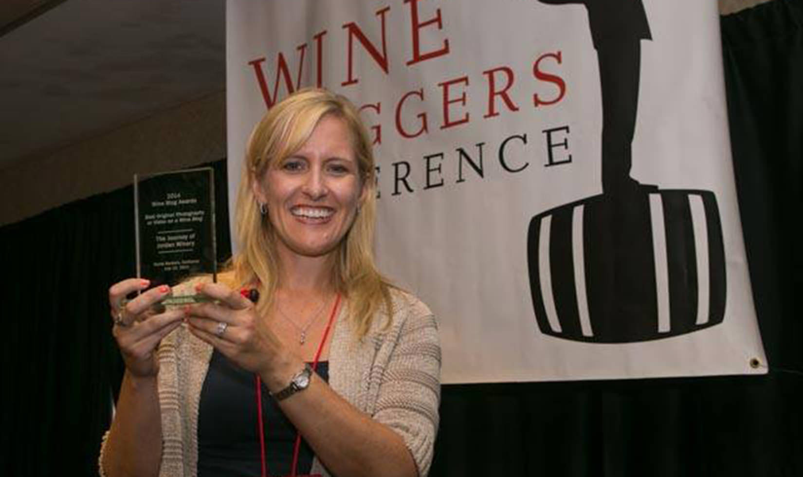 Lisa Mattson, Director of Marketing and Communications at Jordan Winery accepting an award for best photo and video on a wine blog at the 8th annual Wine Blog Awards
