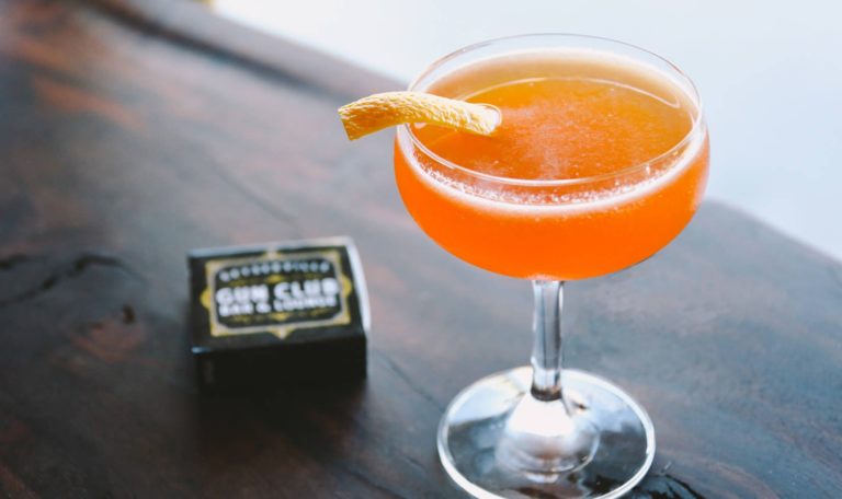 "Paper Plane", a cocktail with an orange zest made by Geyserville Gun Club & Lounge