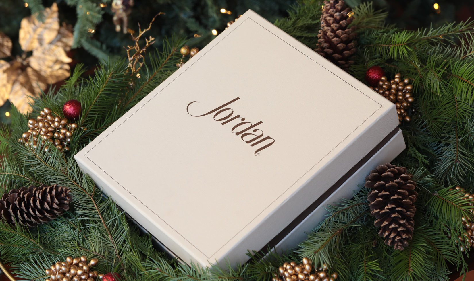 Jordan Winery gift box with festive holiday background