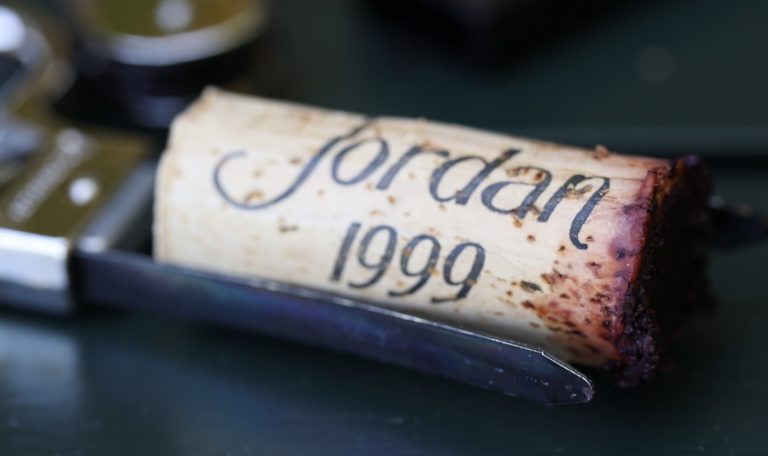 close up of Jordan Winery 1999 Sonoma County Cabernet Sauvignon Cork in an ah-so bottle opener
