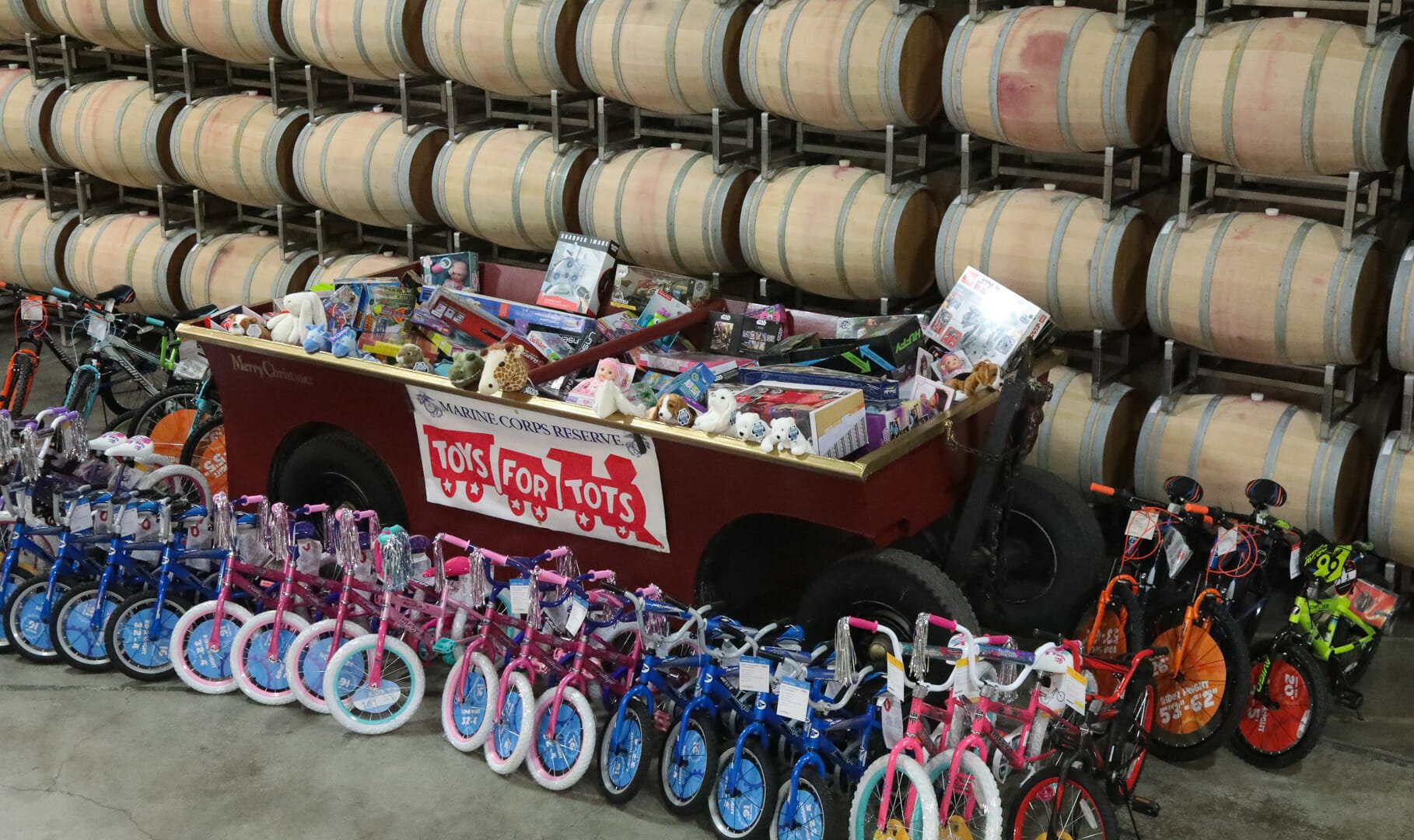Toys for Tots donations, bikes in a line, Jordan Winery gondola
