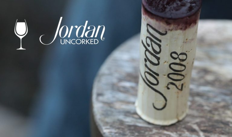 still from a video made by Jordan Winery featuring a close up of 2008 Jordan Winery Cabernet wine cork with image text: "Jordan Uncorked"