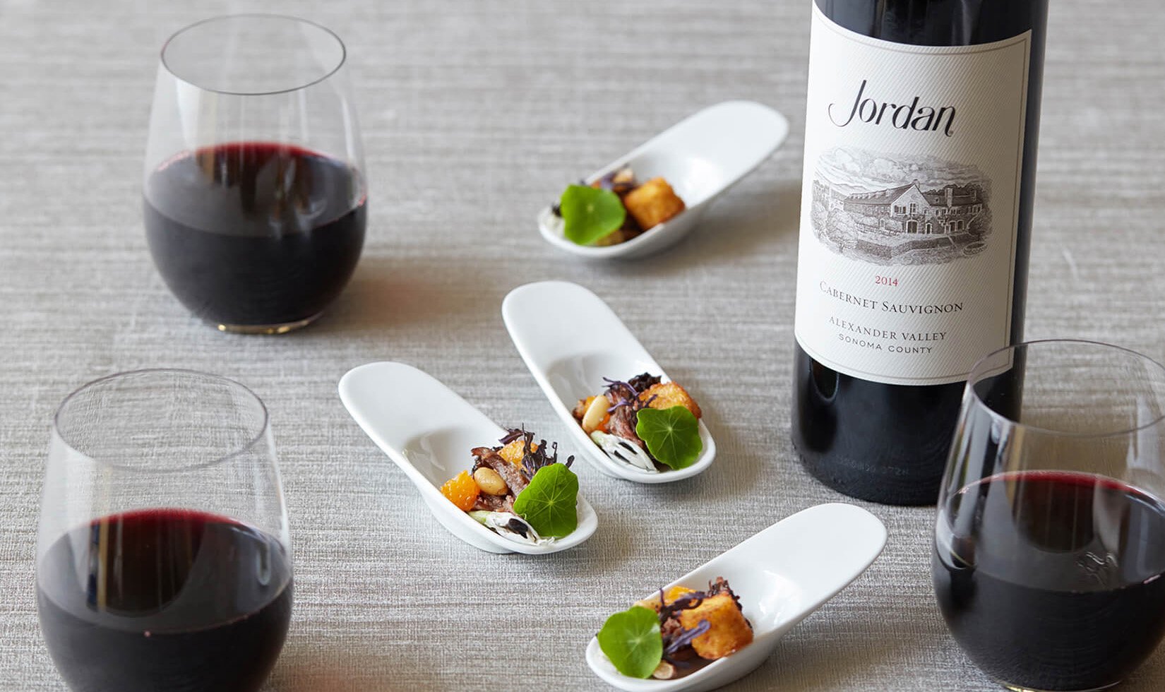 2014 Jordan Cabernet wine bottle with food