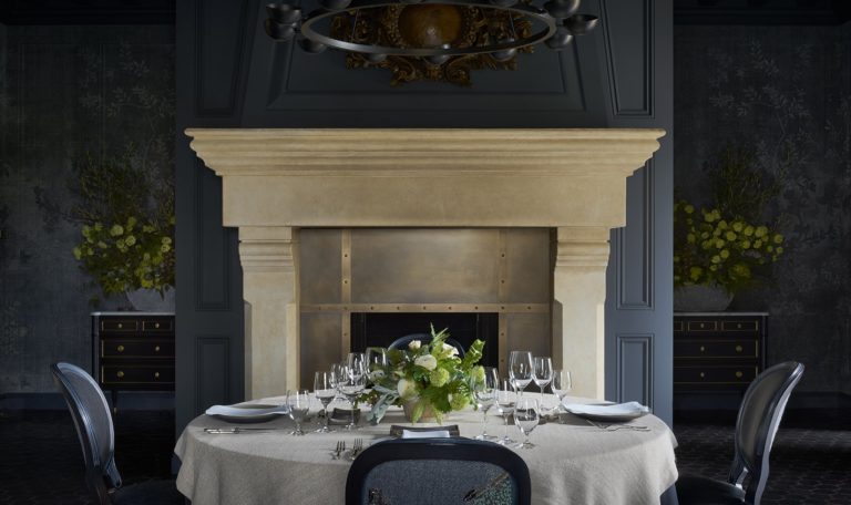 Jordan Winery dining room table with fireplace after remodel