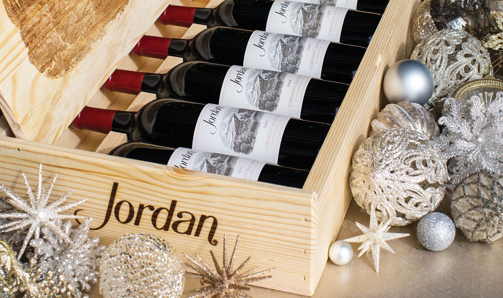 Six bottle wood box with two bottles each of the 2007, 2008 and 2009 Jordan Cabernet Sauvignon