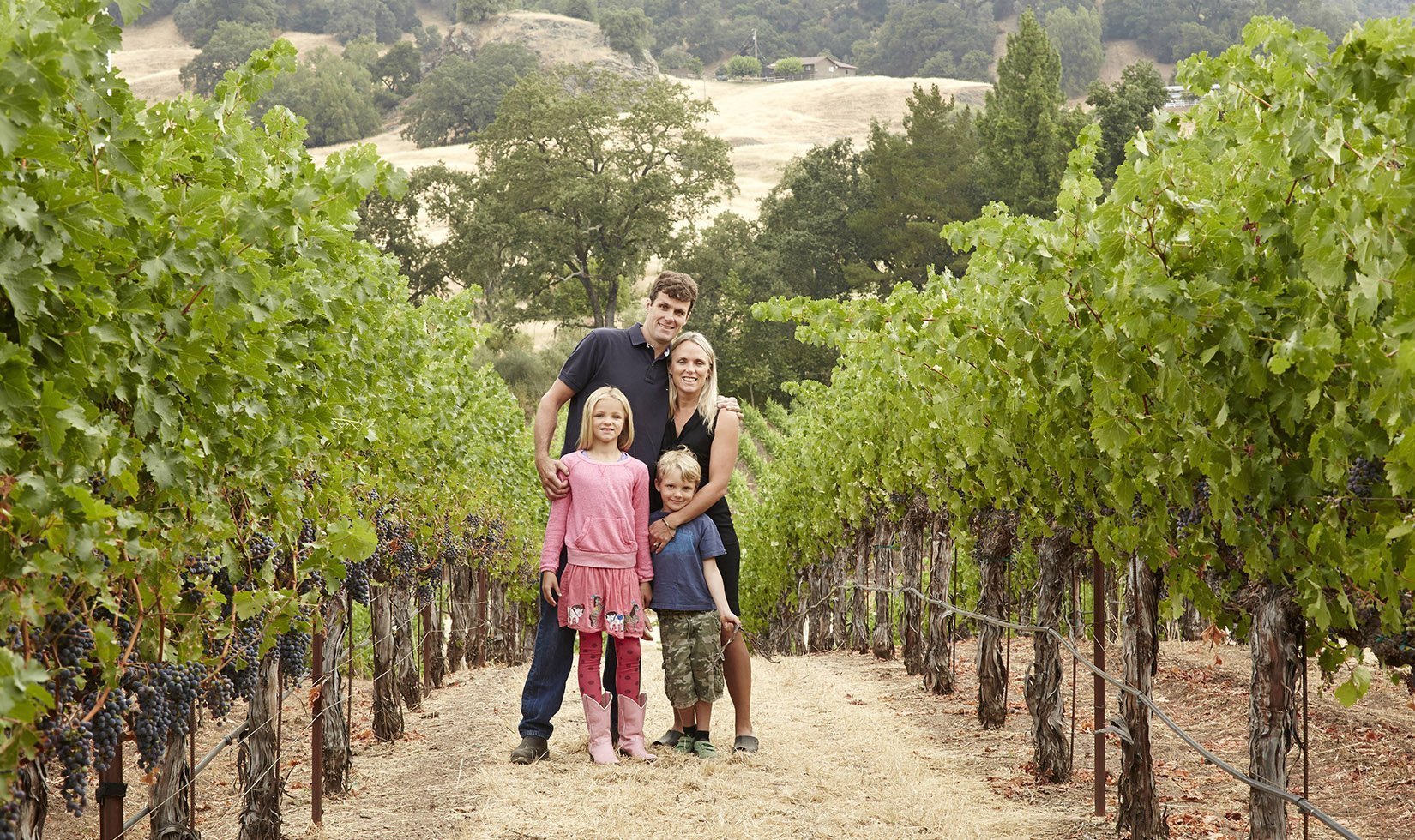 Miller Family of Garden Creek Vineyards in their Olive Hill vineyard