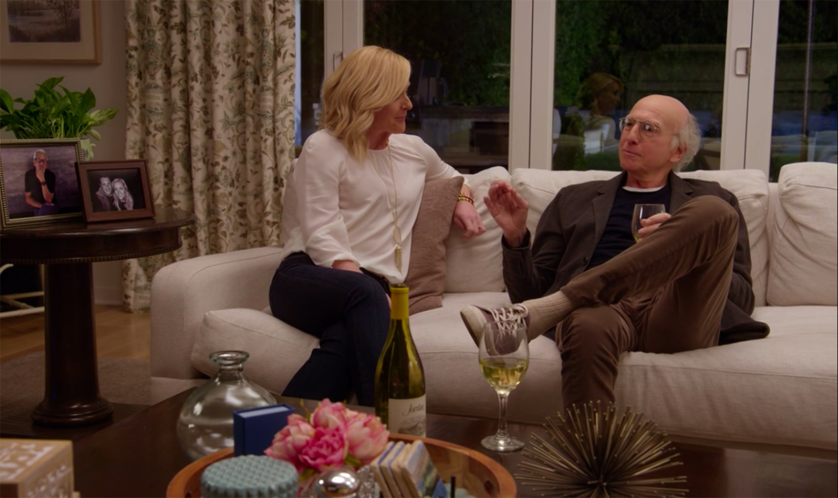 Curb Your Enthusiasm Season 10 with Jordan Chardonnay on coffee table