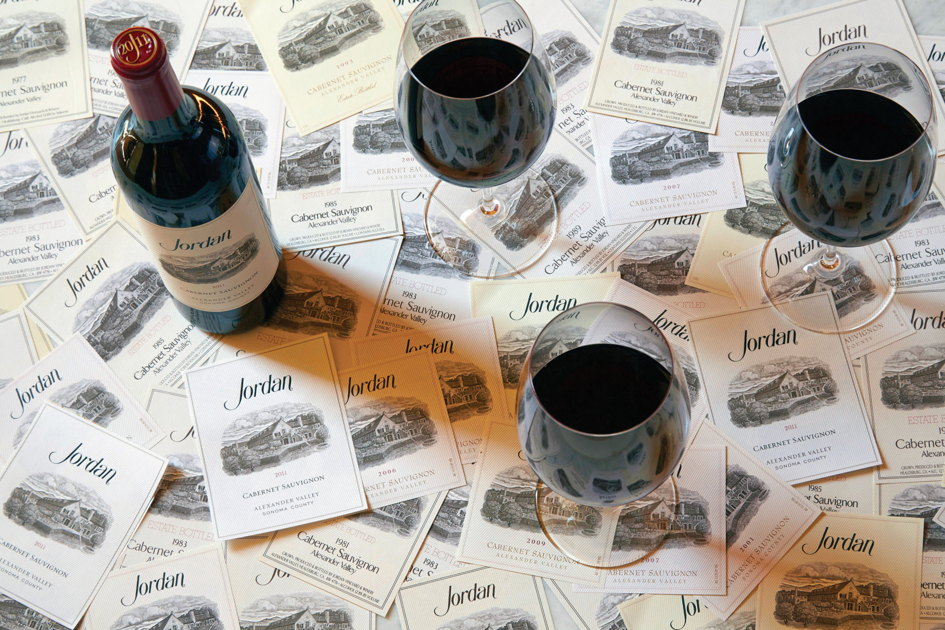 Jordan labels, bottle and glasses of Cabernet Sauvignon