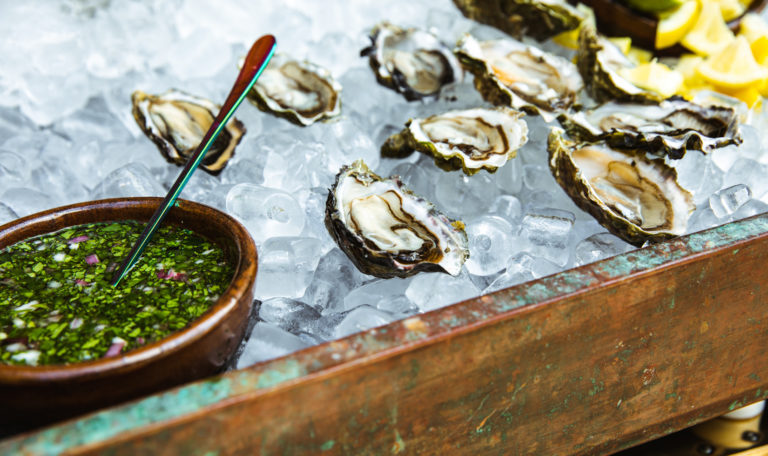 oysters on ice with hogwash sauce