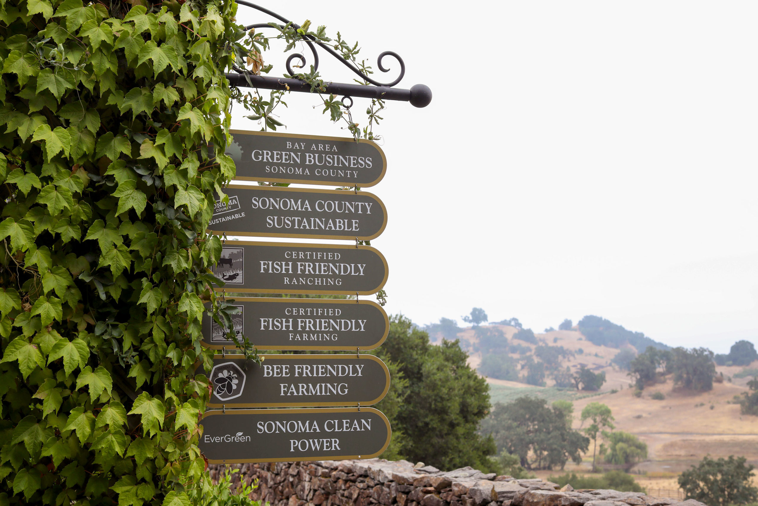 Sign showing the green business certifications that Jordan Winery has earned