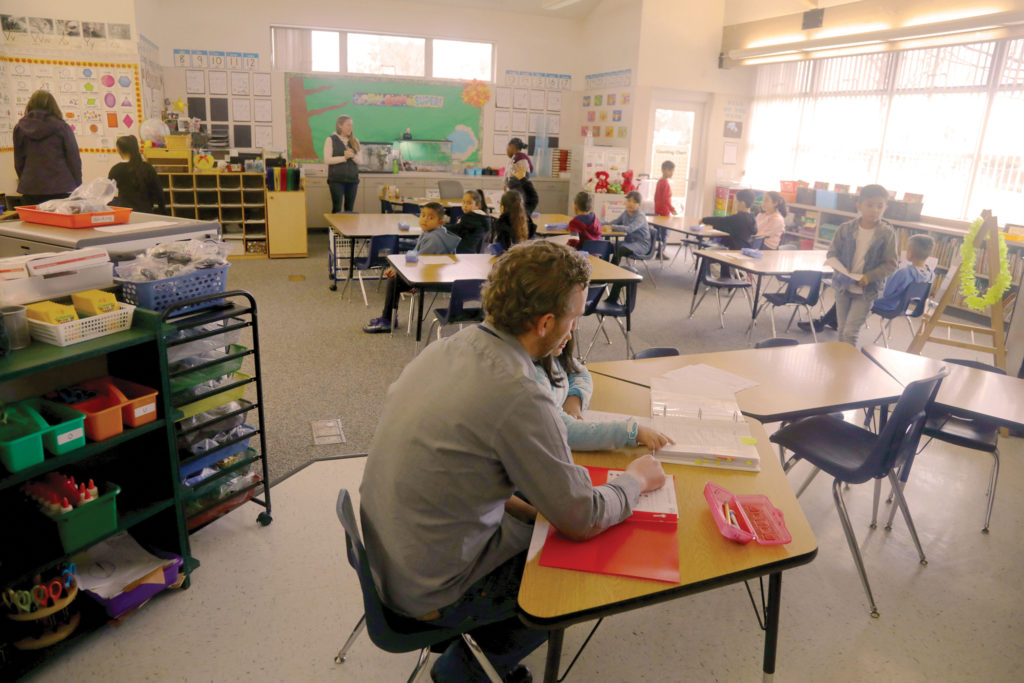 Classroom filled with students and teachers