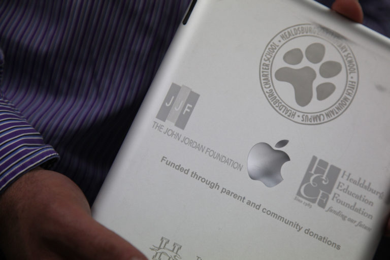 Tablet engraved with John Jordan Foundation logo