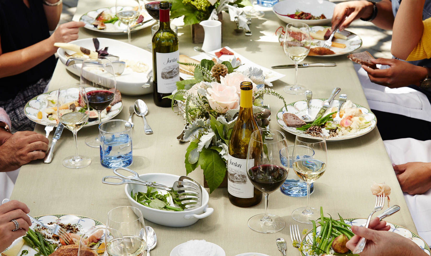 Table setting with wine, glasses, decorations