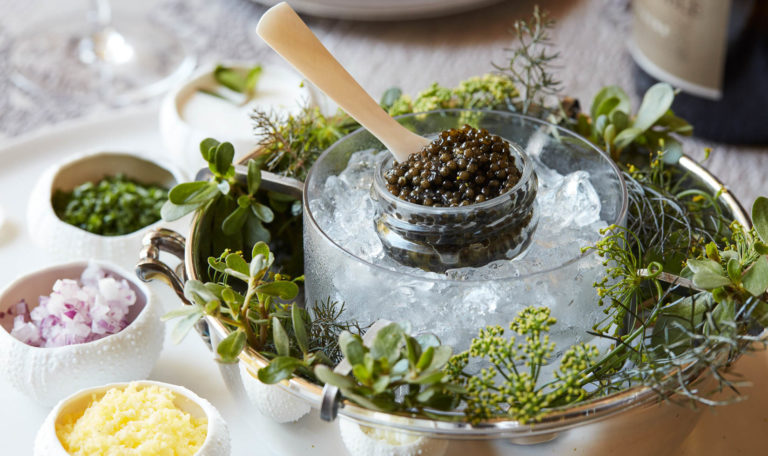 Chef’s caviar collaboration and elegant accoutrements.