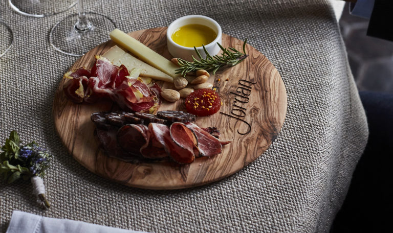 Artisanal salumi on a wooden plate