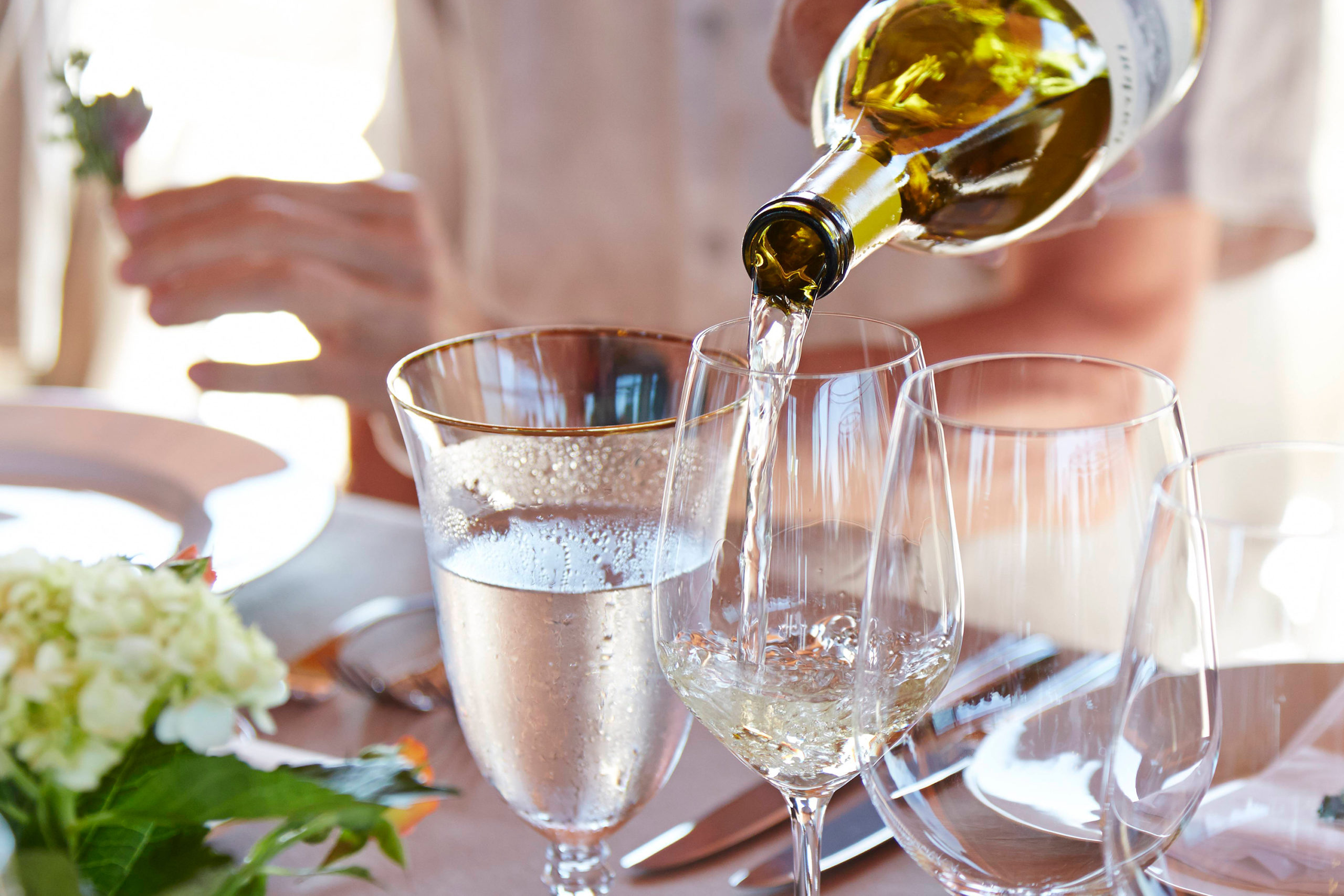 Pouring Jordan Chardonnay at a beautifully set table