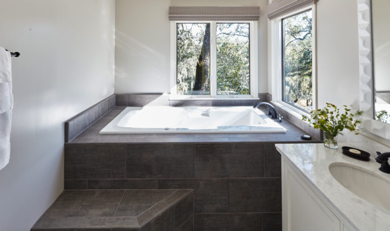 jacuzzi bathtub with a view of sonoma county vineyards