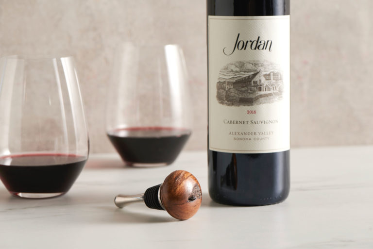 Wine accessories and bottle of Jordan Cabernet Sauvignon