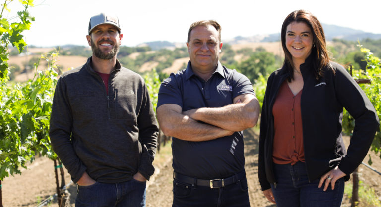 winemakers and owners of jordan winery standing in vineyard