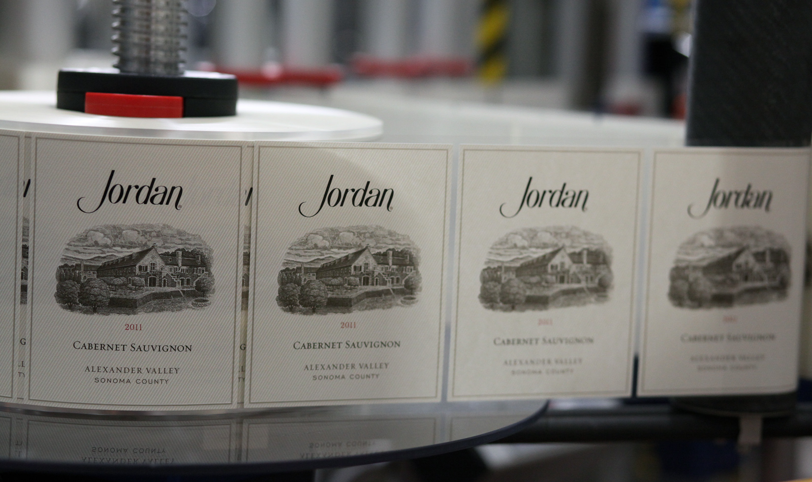 Close-up of a large roll of Jordan's 2011 Cabernet Sauvignon labels.