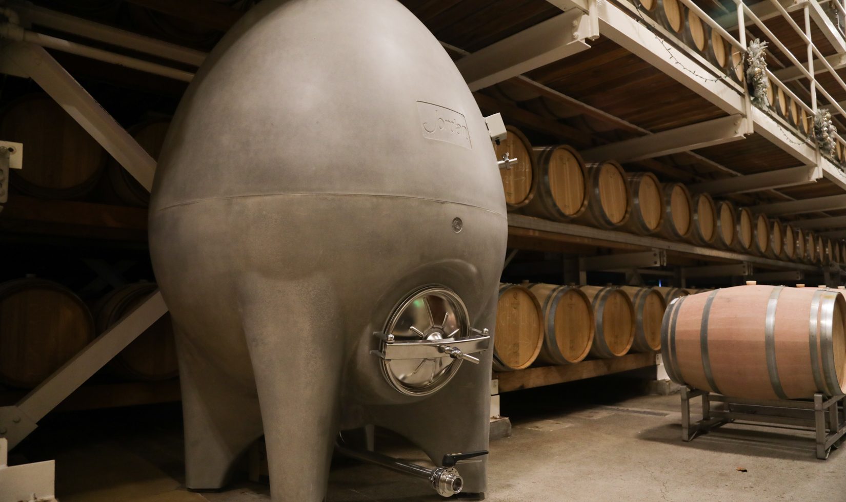 concrete egg vessel in winery barrel room