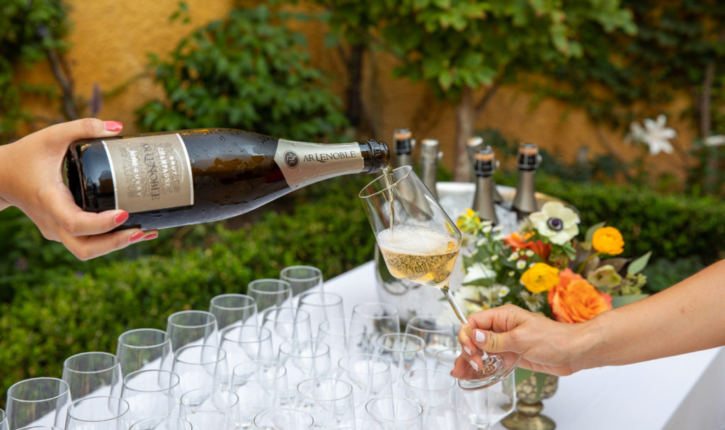 champagne pouring into champagne glass