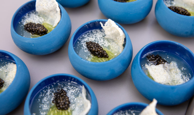 caviar appetizer blue bowls on serving tray