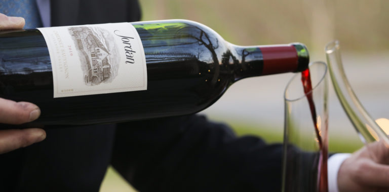 cabernet big bottle pouring into decanter