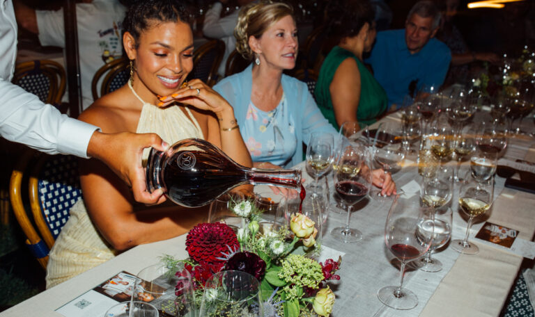 wine server pouring glass of jordan cabernet sauvignon from a decanter for jordin sparks
