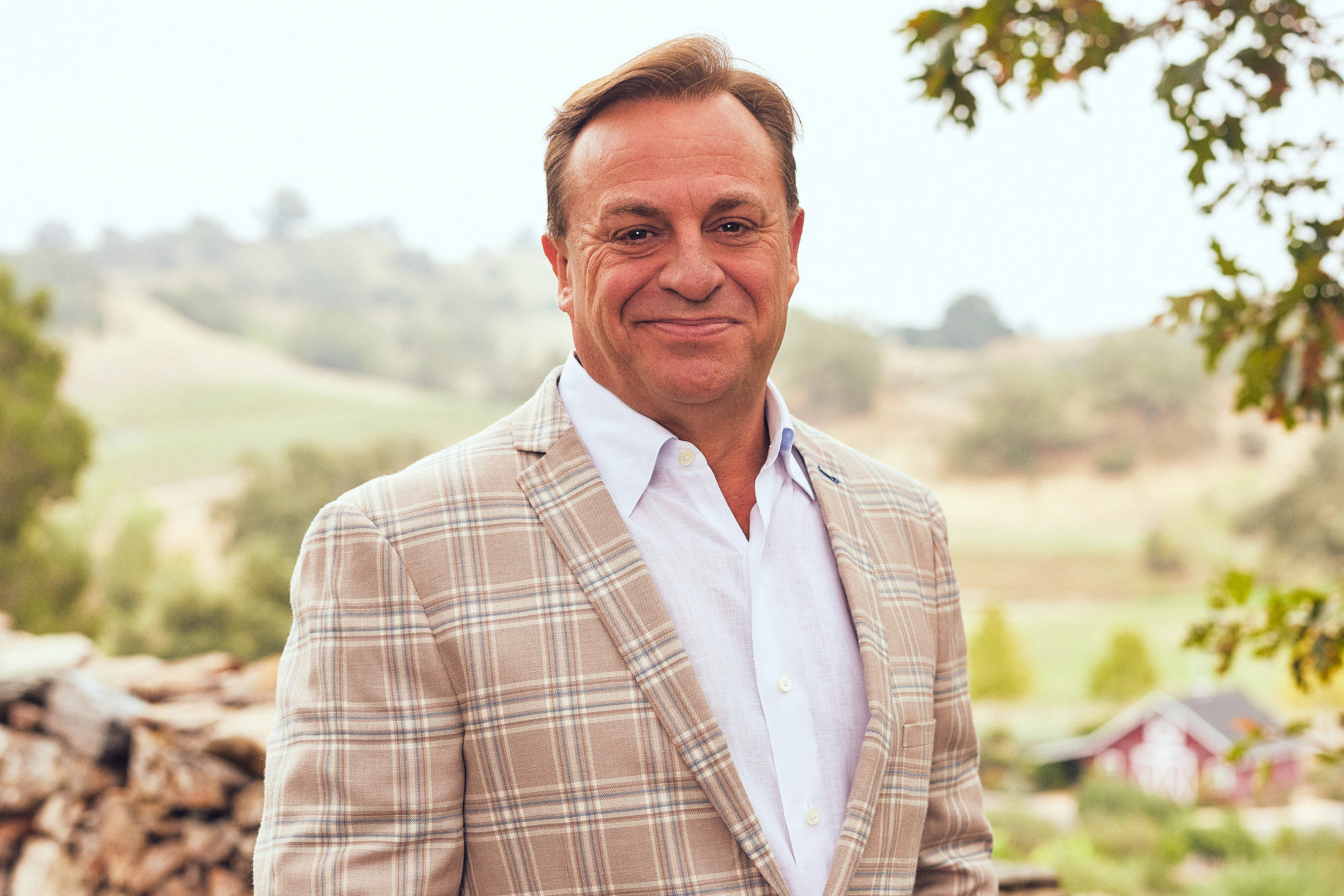 Portrait of chief executive officer wearing blazer and white button up shirt