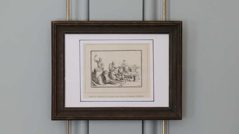 Framed image of coopers building wine barrels