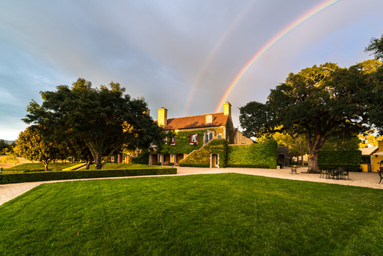 double rainbow over Jordan Estate on overcast day