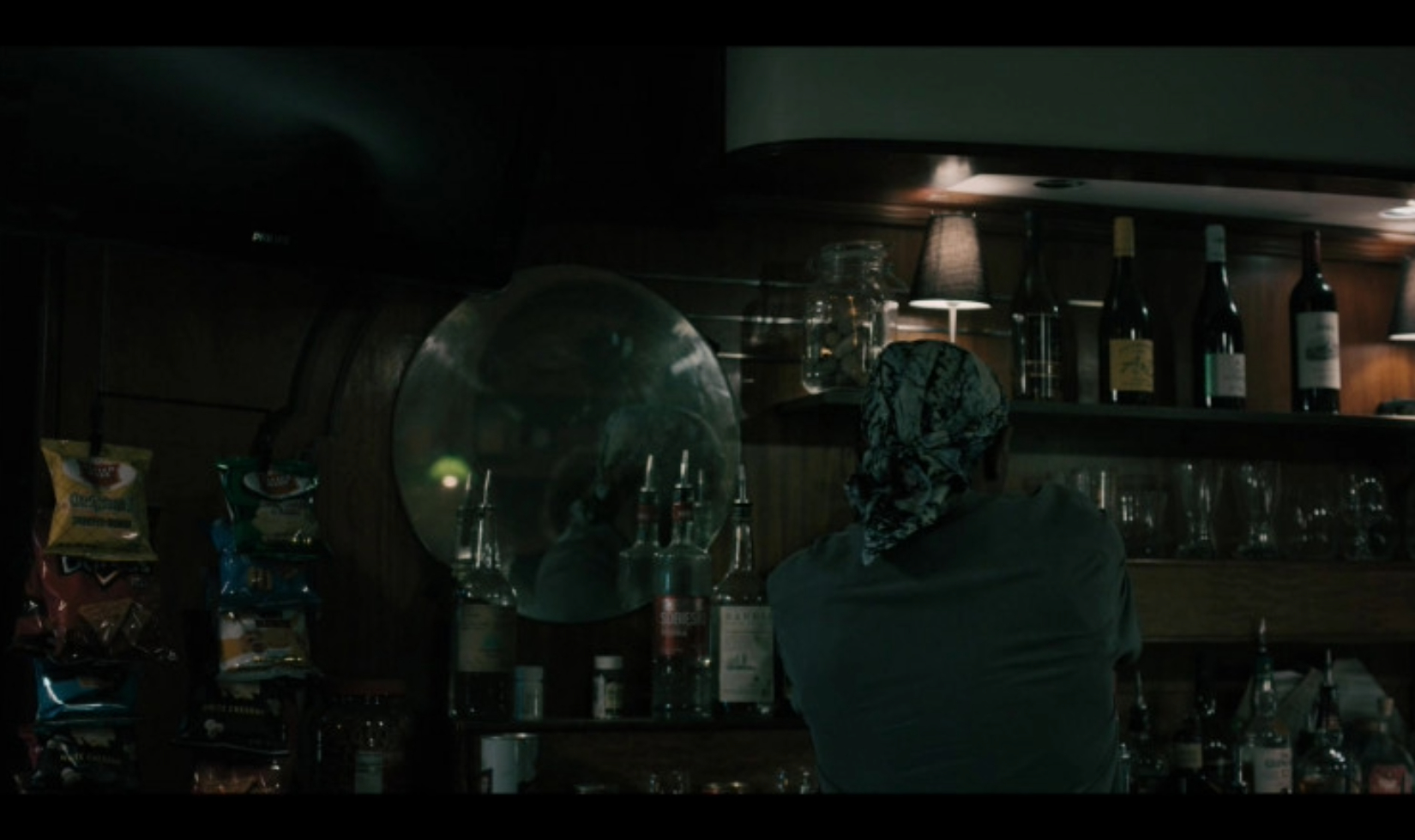 Screenshot from TV series Justified: City of Primevil, showing Jordan Cabernet Sauvignon on the shelf behind a bar in a scene