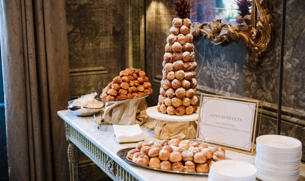 croquembouche on table decorated for christmas