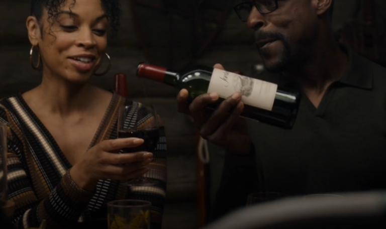 Screenshot from TV series This Is Us showing a man pouring a glass of Jordan Cabernet into a woman's glass