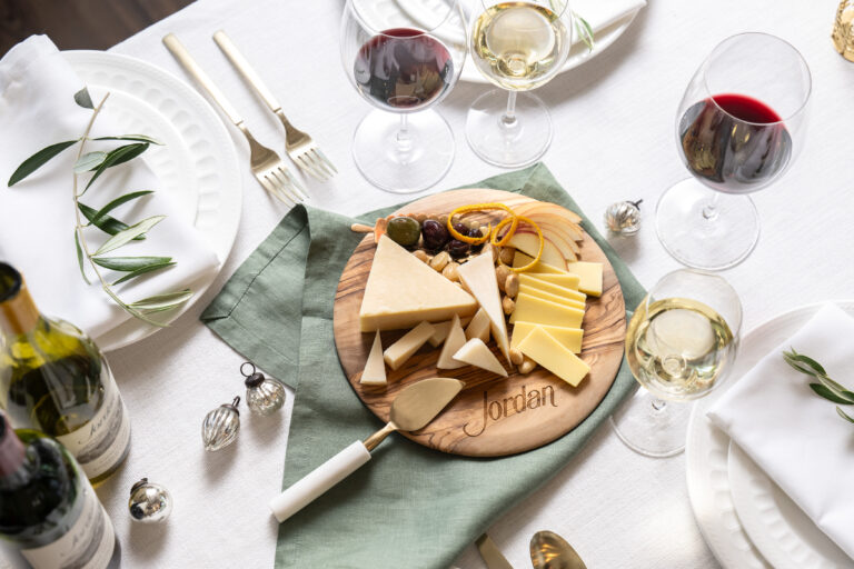 pieces of cheeses on jordan engraved olive wood serving platter