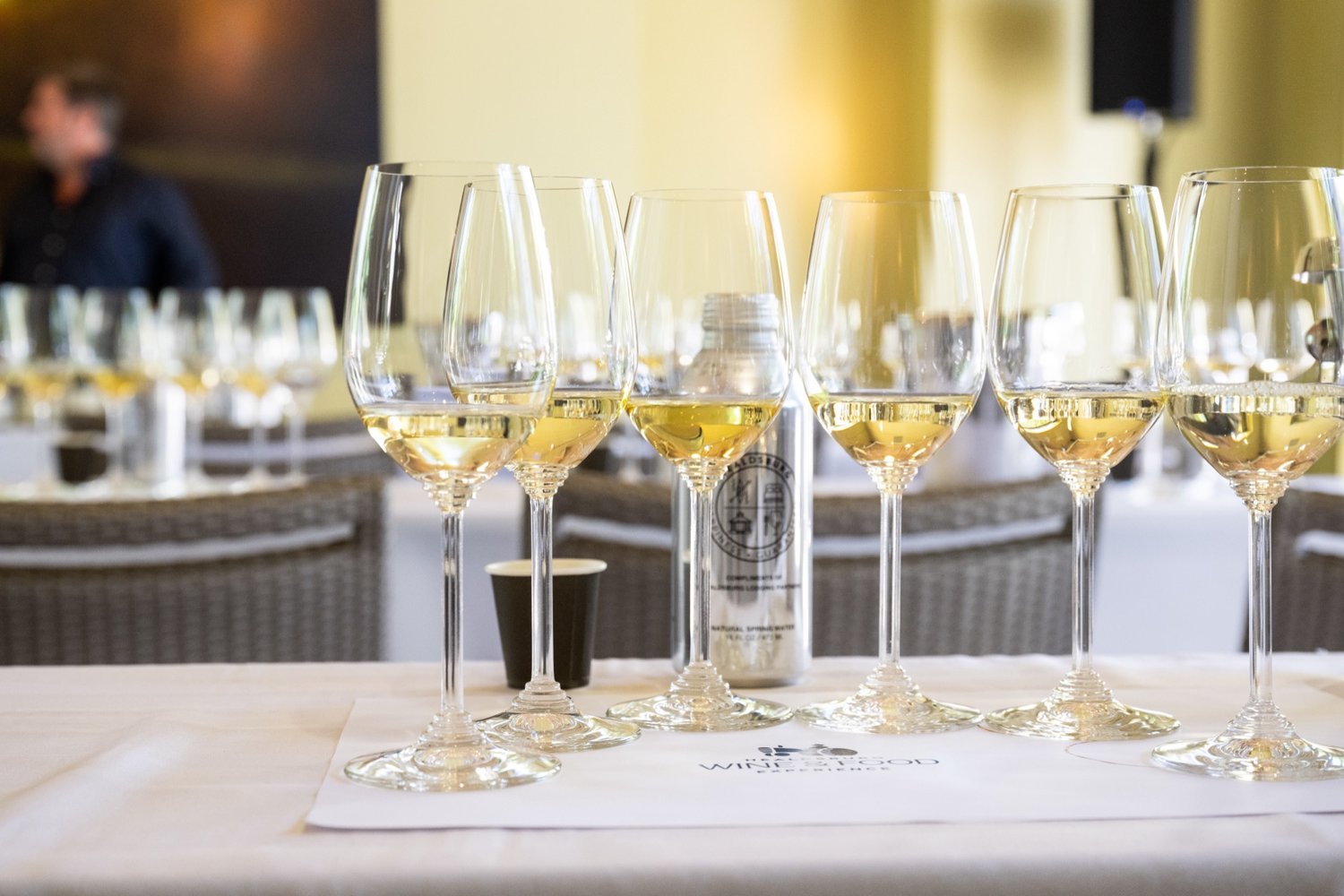 glasses of chardonnay poured and lined up on table for a tasting at the healdsburg food and wine festival