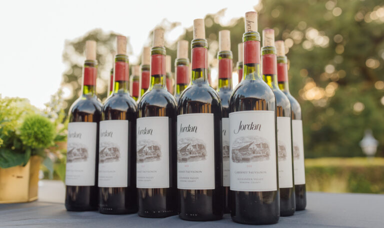bottles of jordan cabernet sauvignon on outdoor table during dinner