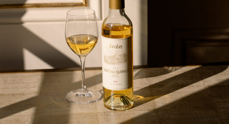 375mL bottle of dessert wine with afternoon shadows and golden color
