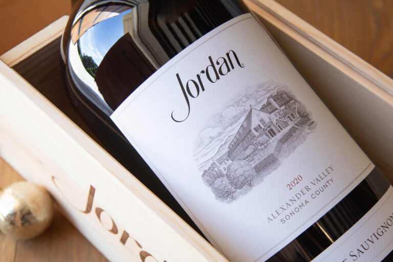 a 12 liter bottle of jordan cabernet in a wooden display box